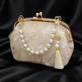 Sac à main fleurie beige avec perle blanche